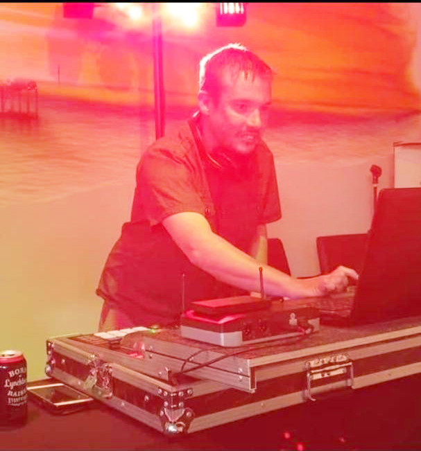 DJ Chris playing front bar of Grosvenor Hotel